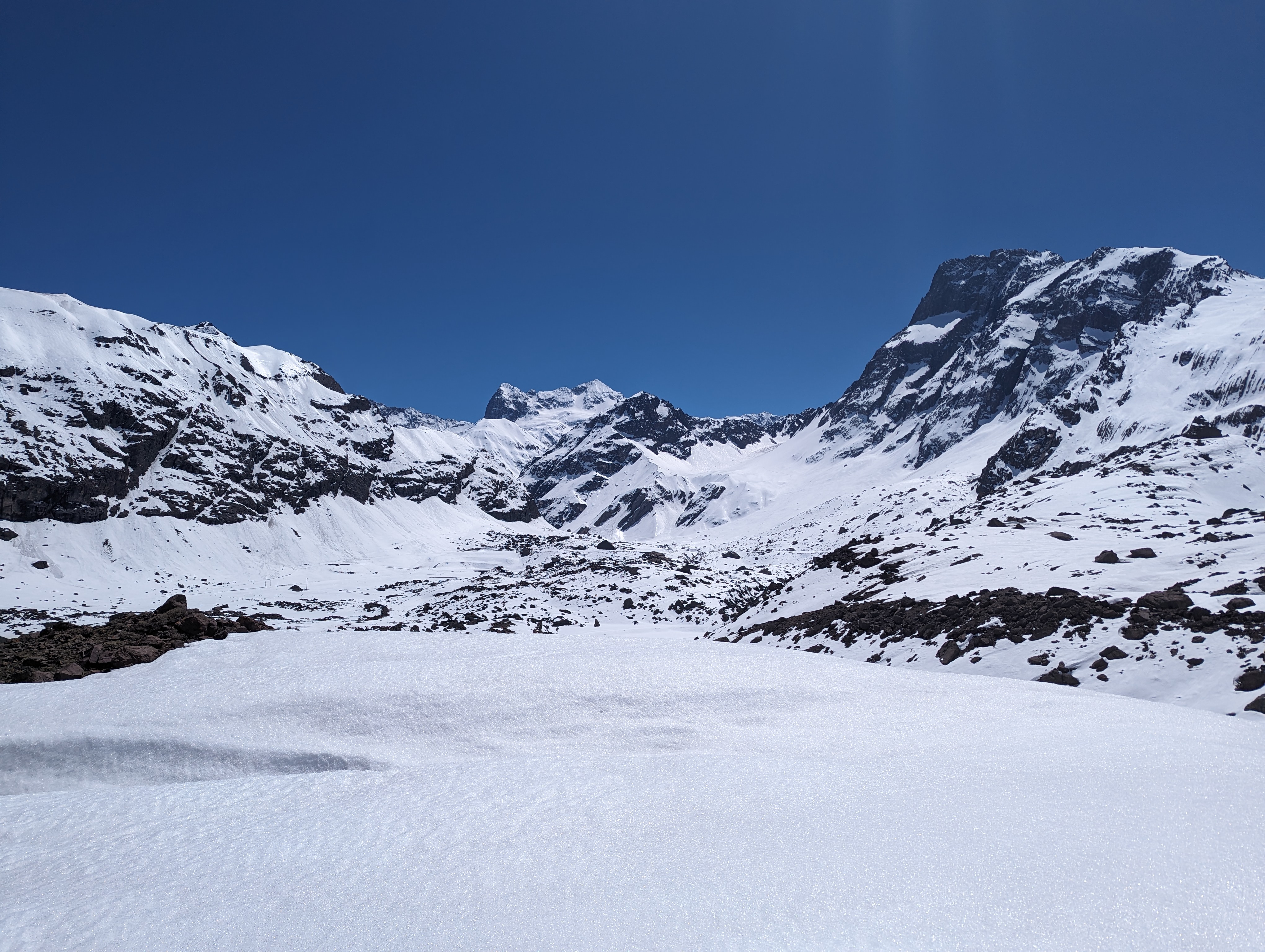 Snow-covered mountain range under a clear sky